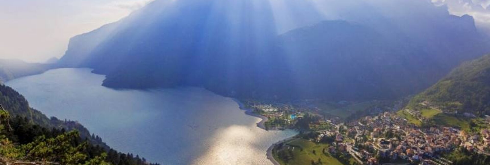 Lake Molveno, a natural oasis away from the city, surrounded by the Dolomites