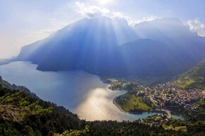 Lake Molveno, a natural oasis away from the city, surrounded by the Dolomites