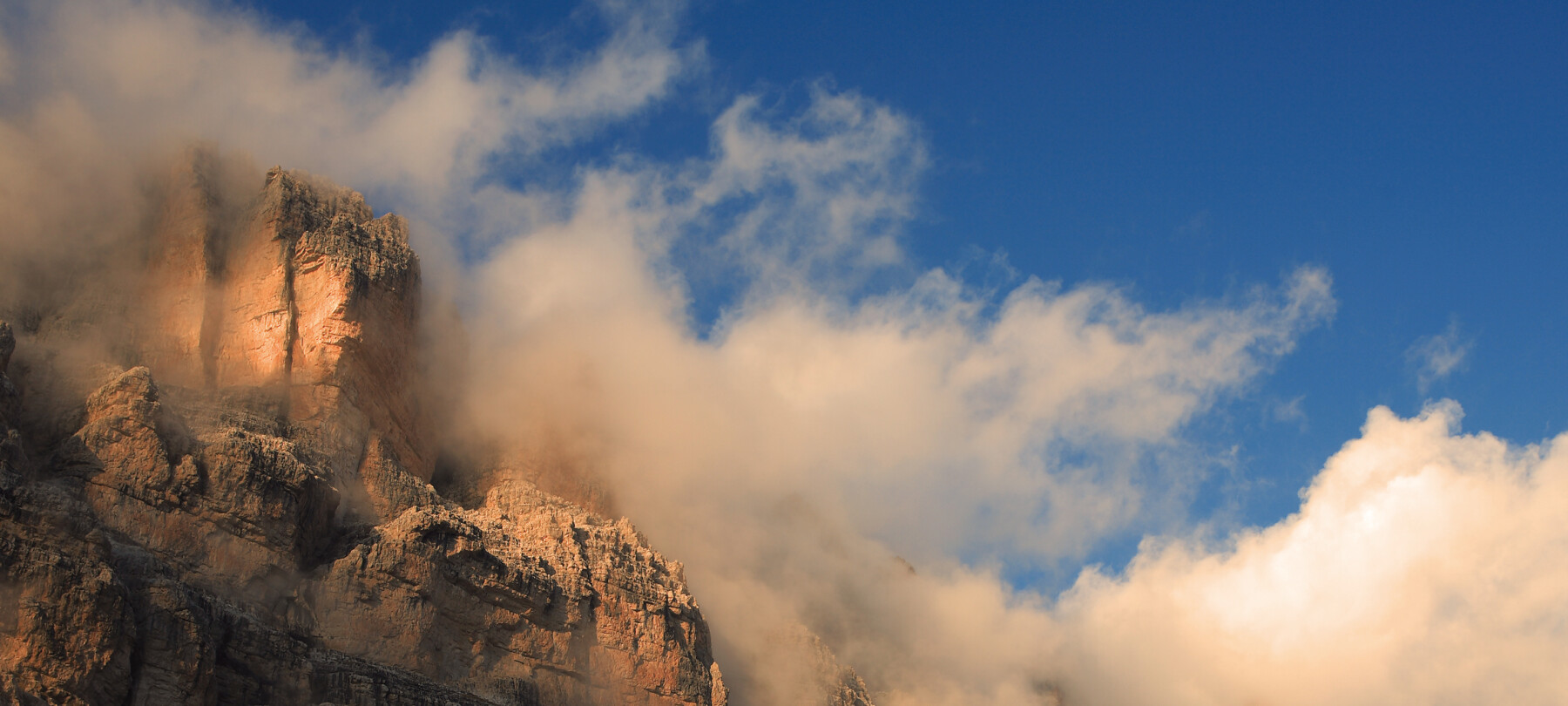 Dolomiti di Brenta - Cima Tosa avvolta nelle nuvole | © Pio Geminiani