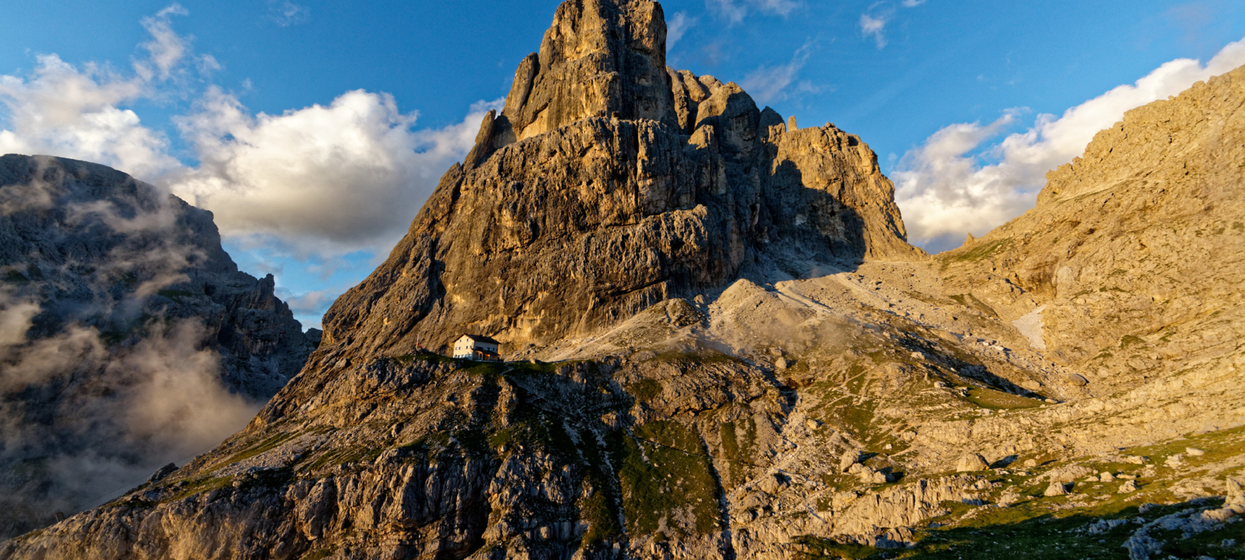 Elisa, Piero and a mountain hut in the Pale di San Martino.