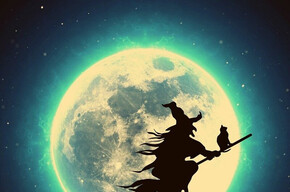The image shows a hag on a broomstick and a full moon in the background