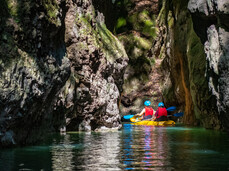 Kayaking through Rio Novella Canyon