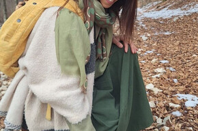 Annachiara Zecchetto gathering natural elements in the woods during a Nature Therapy session for the LiberaMente event taking place in Andalo, Paganella, Trentino.
