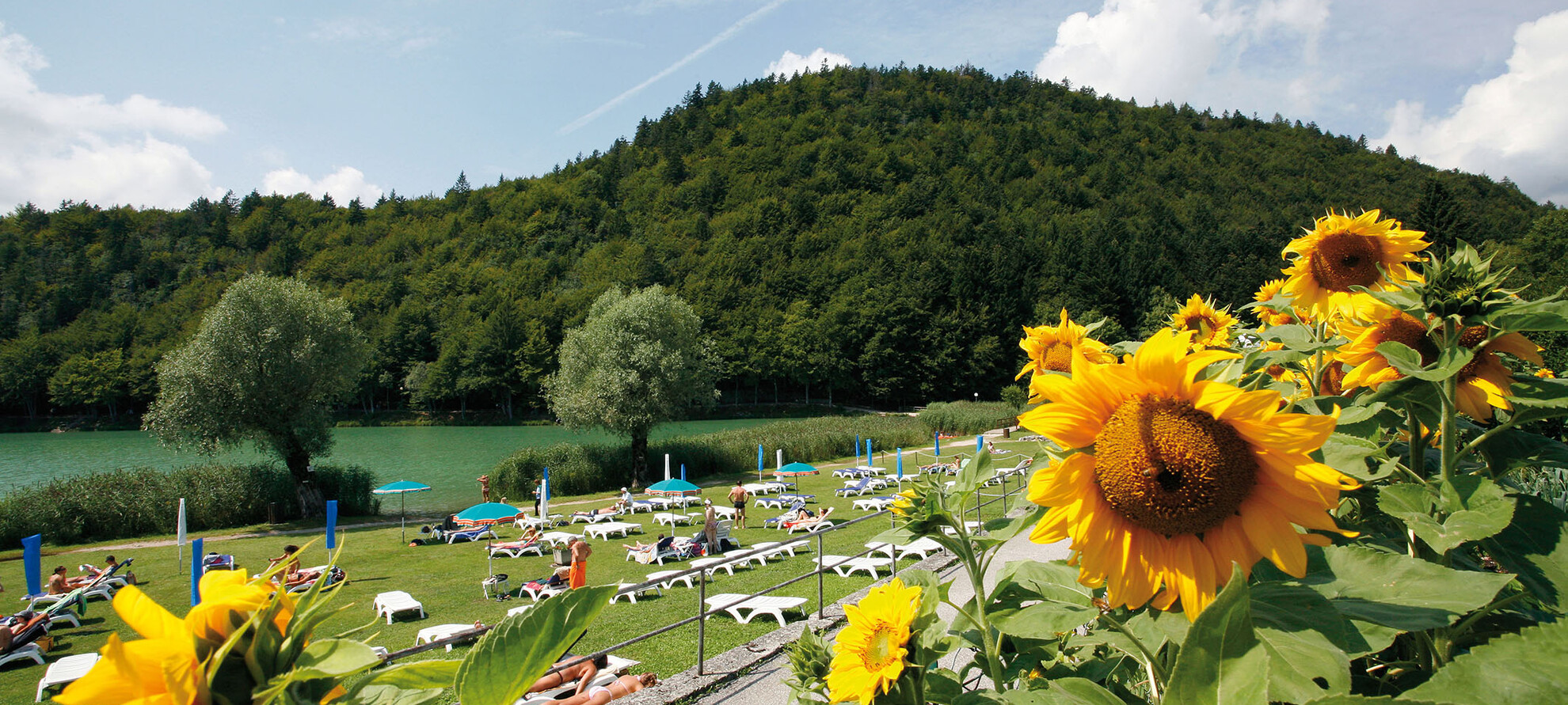 Prendere il sole sulle spiagge dei laghi trentini