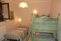 Stanza con letto a castello Stanza con letto a castello