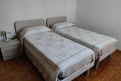 Stanza con letti singoli