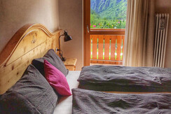 camera-con-vista-montagna-baita-affitto-charme-2-r camera-con-vista-montagna-baita-affitto-charme-2-r