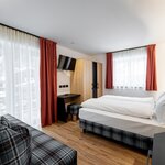  foto van Double room with extra bed