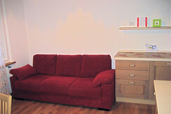 cucina-soggiorno con divano letto