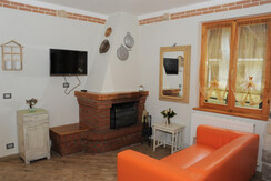 Zona caminetto e tv satellitare Zona caminetto e tv satellitare