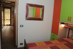 Stanza matrimoniale con uscita verso il soggiorno Stanza matrimoniale con uscita verso il soggiorno