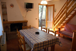 Wohnung Pippi 6/A: kamin in Wohnzimmer Wohnung Pippi 6/A: kamin in Wohnzimmer