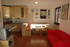 Ampio soggiorno con zona cottura Ampio soggiorno con zona cottura