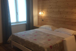 STANZA 1 APPARTAMENTO LARICE STANZA 1 APPARTAMENTO LARICE