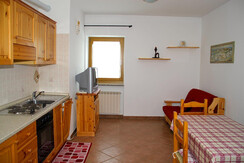 Cucina con divano letto