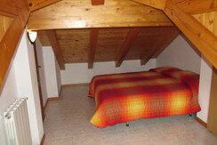 mansardina con letto