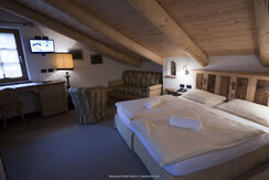 Arnica-Soraga_Camera in Baita_01