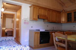 Particolare interni. Soggiorno-cucina Particolare interni. Soggiorno-cucina