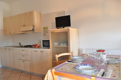 Zona pranzo con angolo cottura