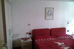 camera matrimoniale con letto aggiunto singolo