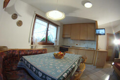 Soggiorno con angolo cottura