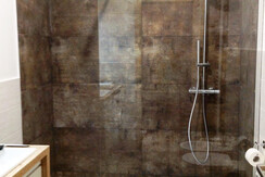 The bathroom with large shower