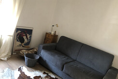 The living room with sofa bed