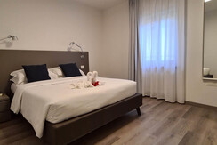 Appartamento La Rocca camera da letto